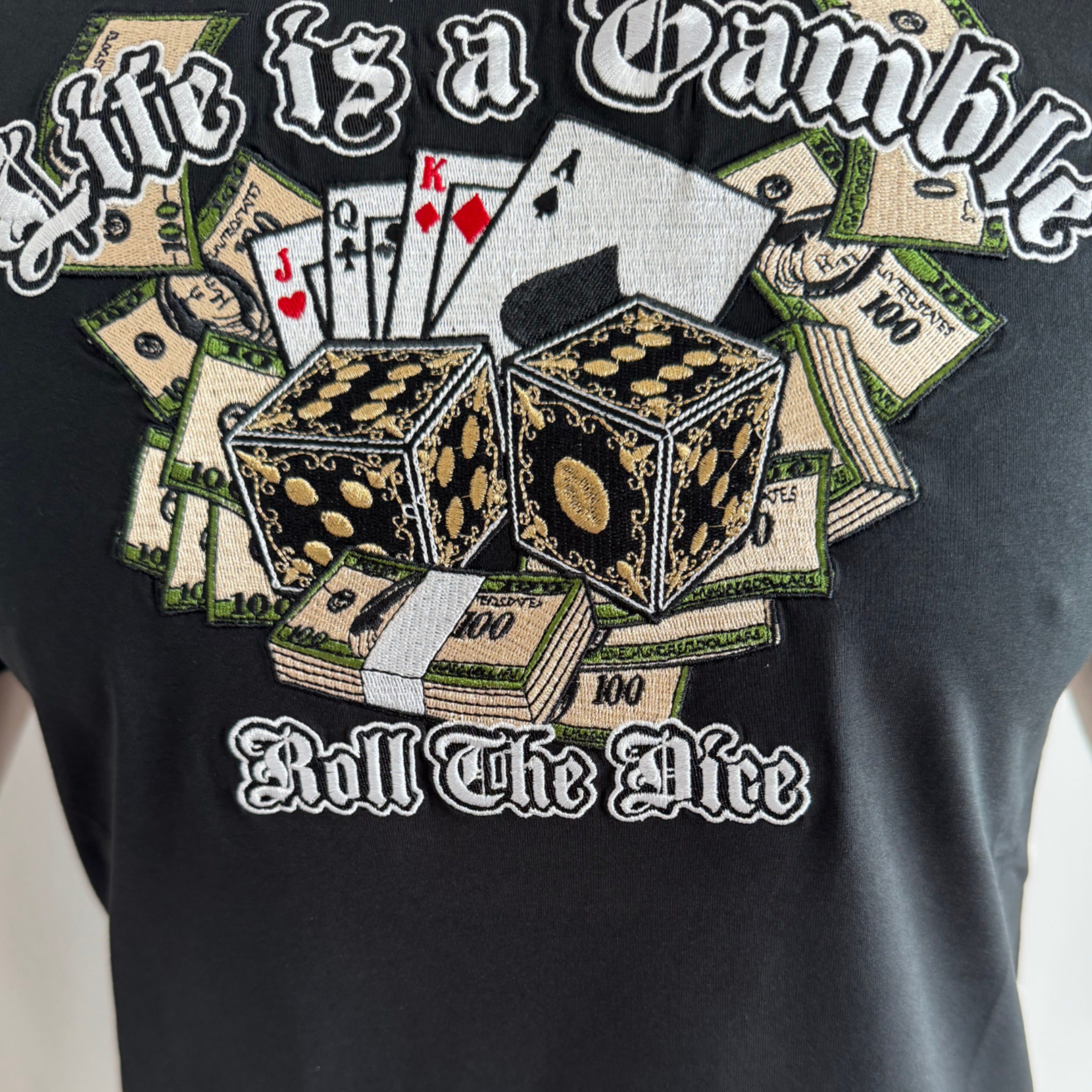 Camiseta MVL Life con bordado de la vida es un juego de azar - negra